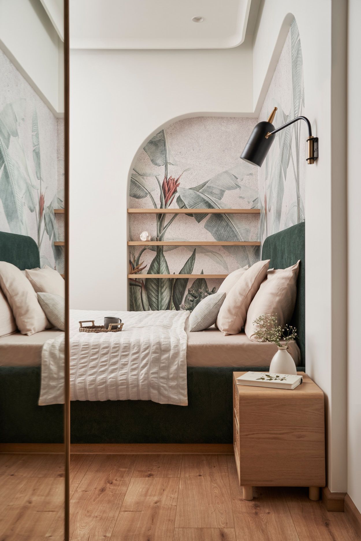Image may contain Book Publication Indoors Interior Design Lamp Furniture Bed Bedroom Room and Plant