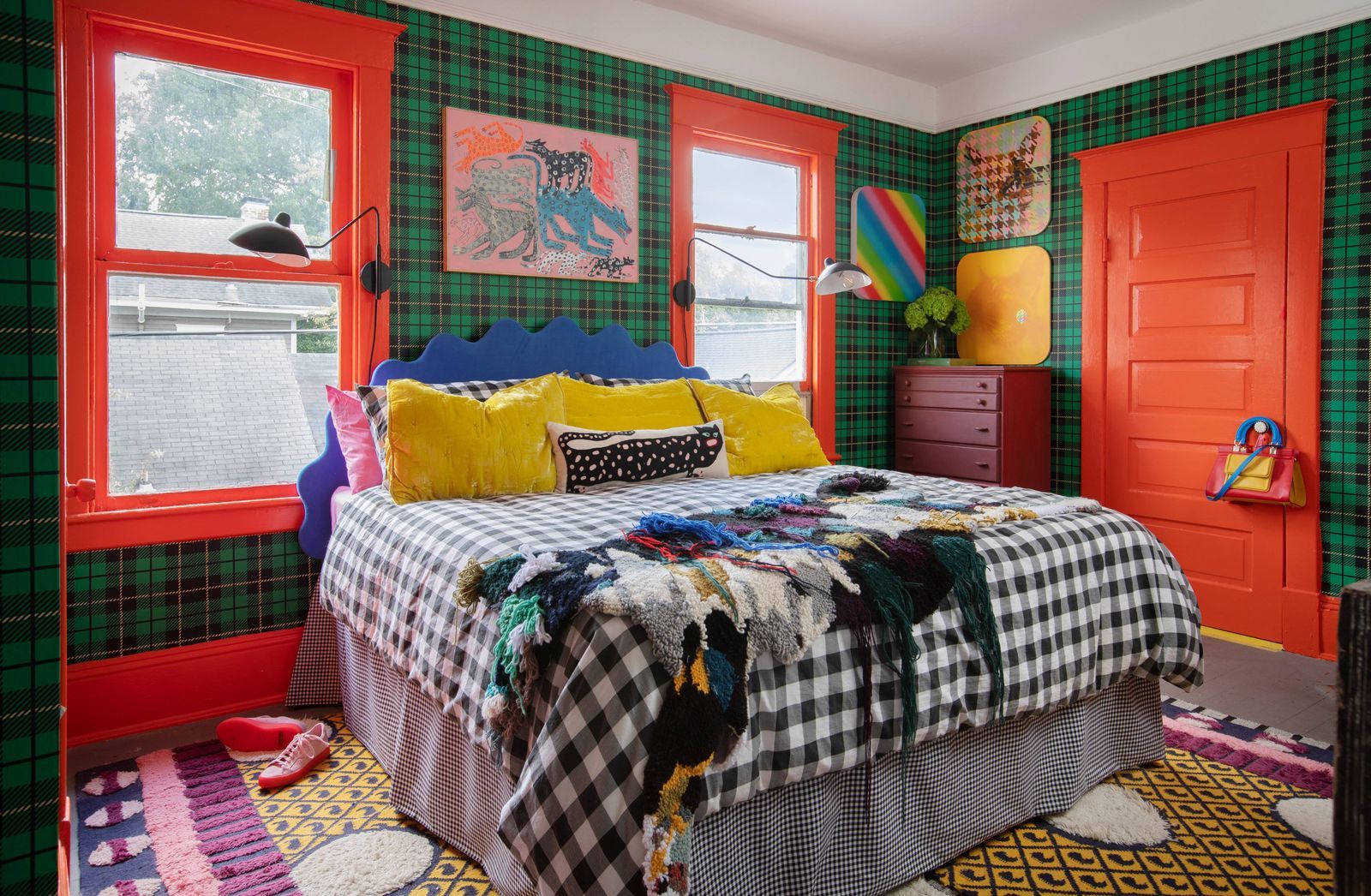 Image may contain Indoors Interior Design Bed Bedroom Dorm Room Furniture Room Home Decor Plant and Clothing