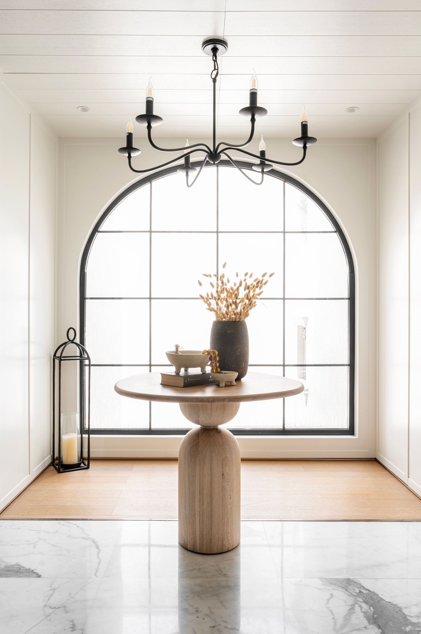 Image may contain Chandelier Lamp Furniture Table Dining Table Indoors Interior Design Architecture and Building