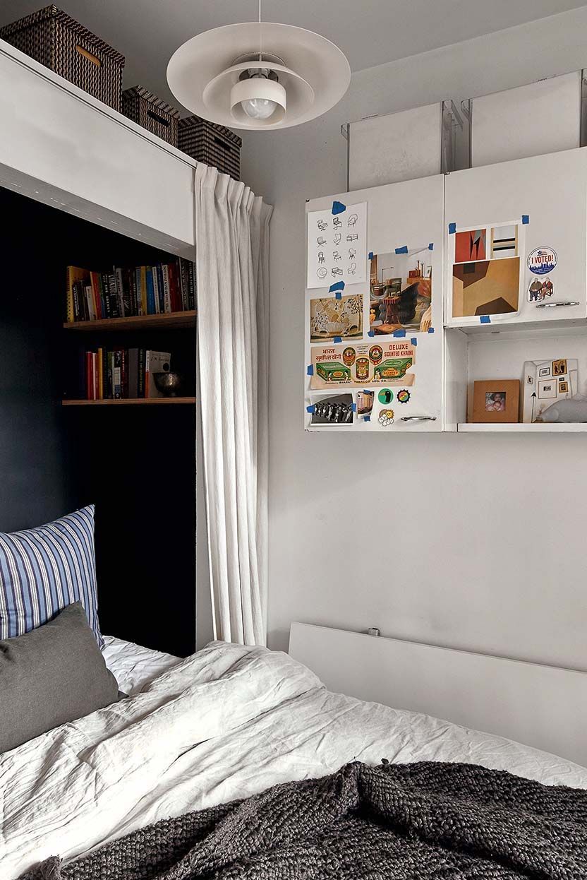 Image may contain Furniture Home Decor Bed Bedroom Indoors Room Interior Design Chandelier Lamp and Cushion