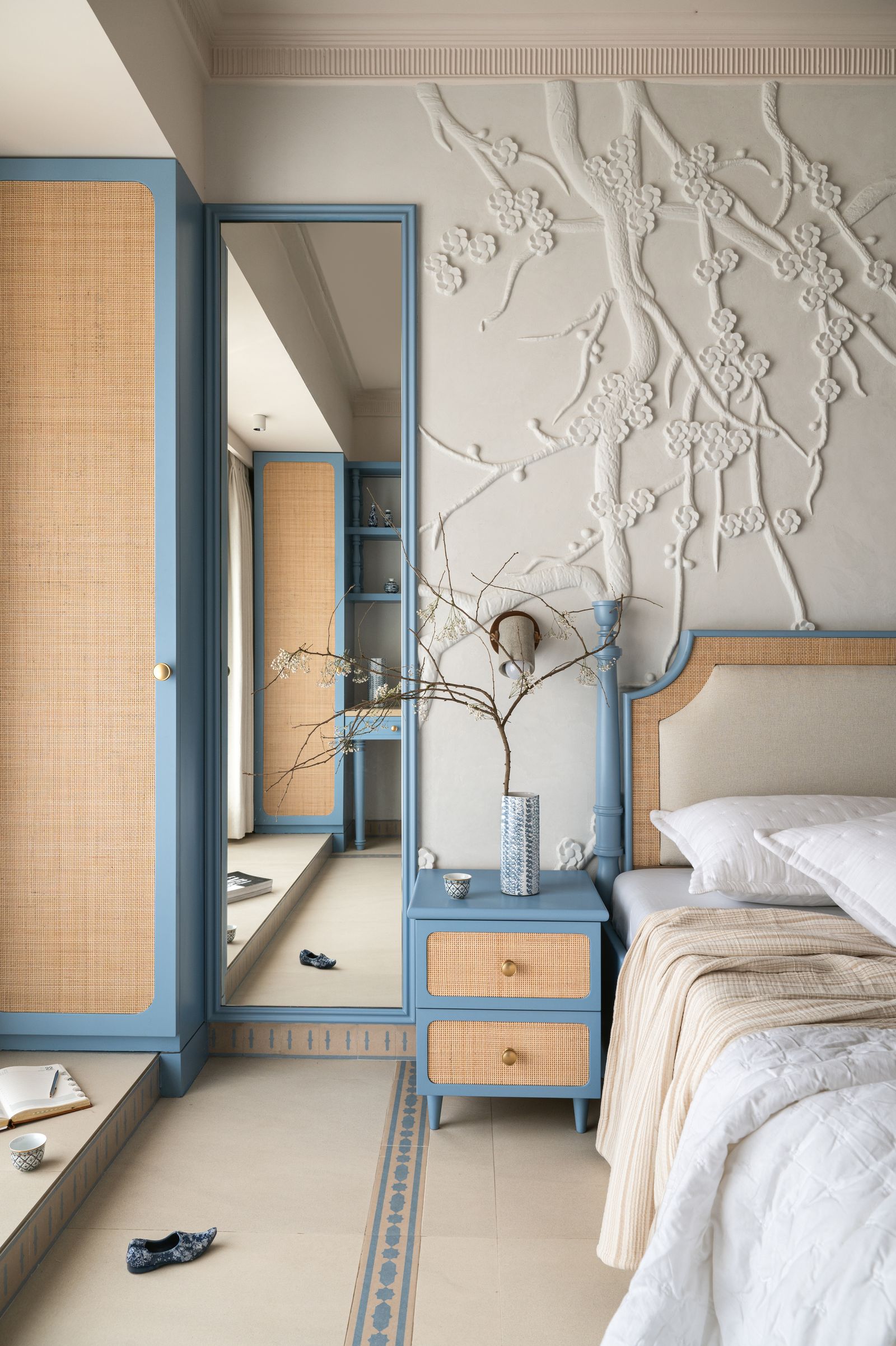 Image may contain Indoors Interior Design Book Publication Bed Furniture Bedroom Dorm Room Room Cup and Clothing