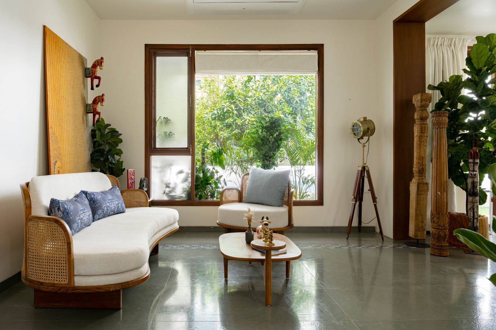 Image may contain Architecture Building Furniture Indoors Living Room Room Home Decor Floor Couch and Chair