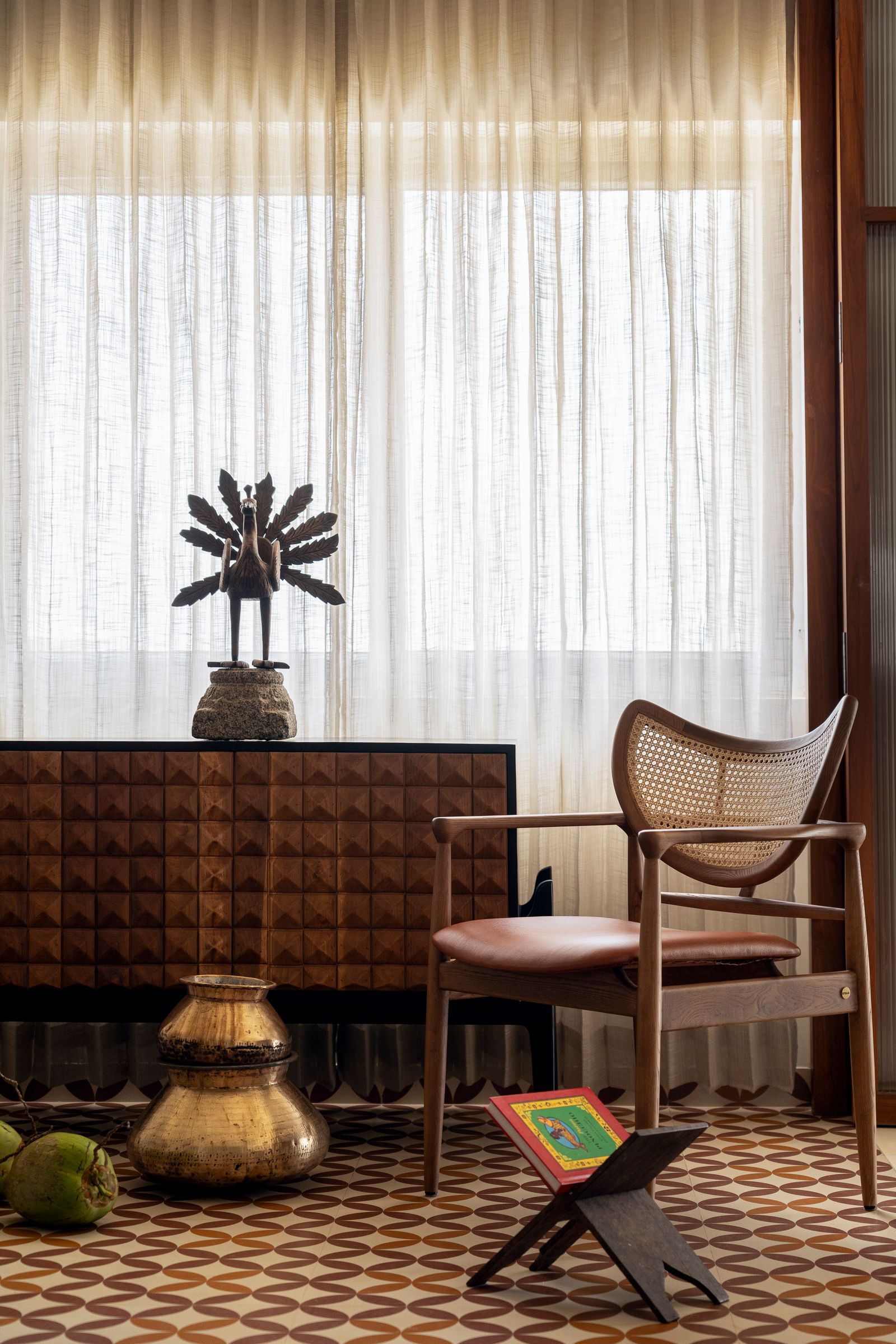 Image may contain Indoors Interior Design Floor Home Decor Chair Furniture Flooring Rug Book Publication and Table
