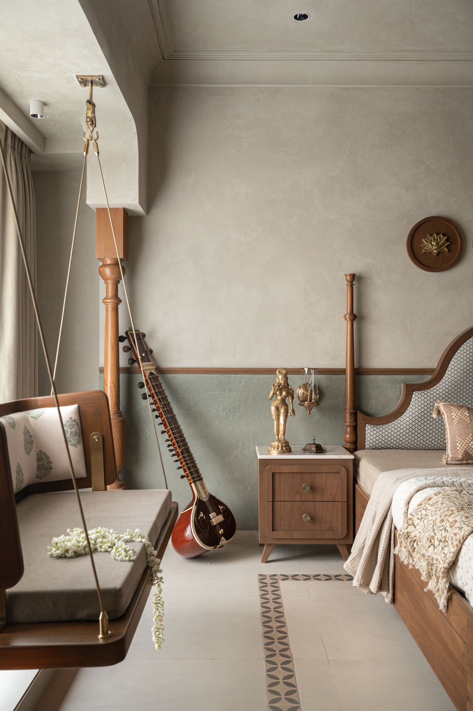 Image may contain Person Indoors Interior Design Furniture Guitar Musical Instrument Bed Home Decor and Lamp