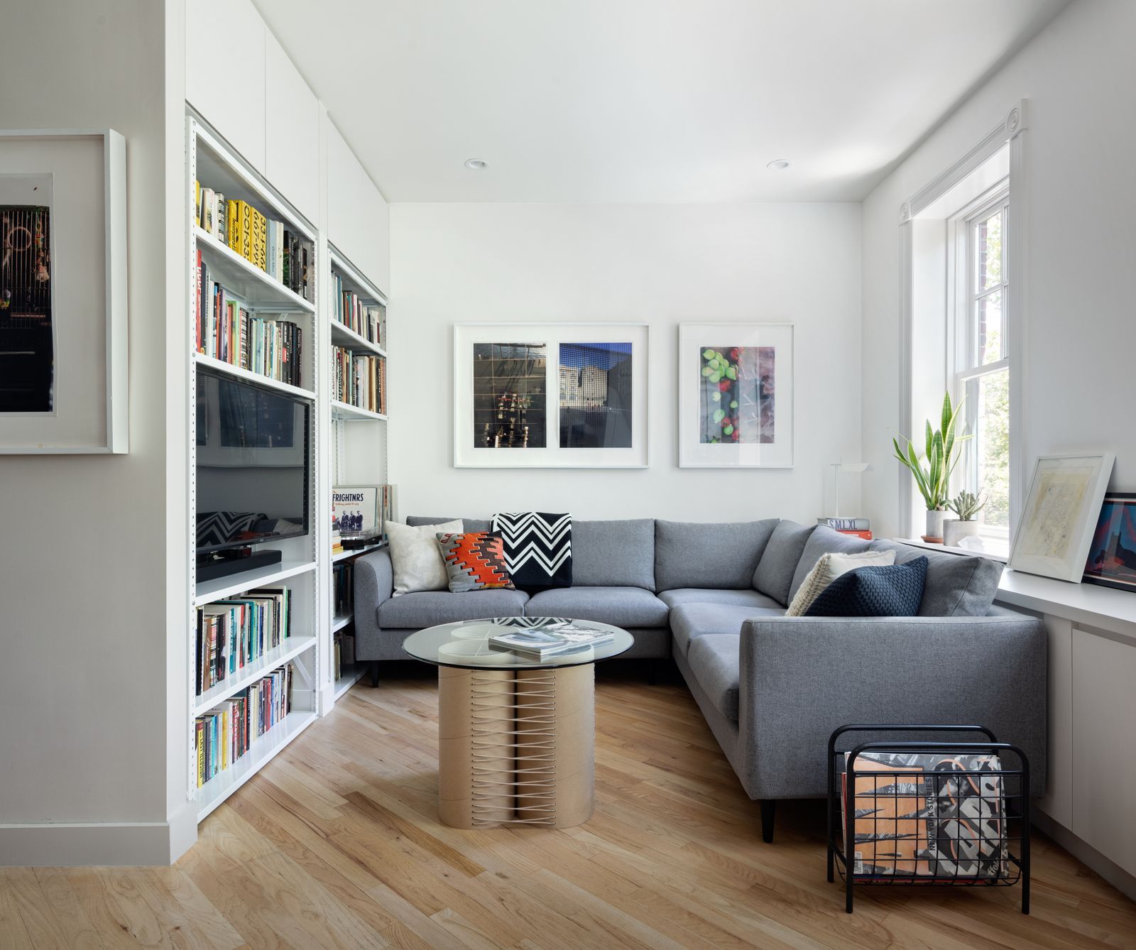 Image may contain Couch Furniture Architecture Building Indoors Living Room Room Home Decor Book and Publication