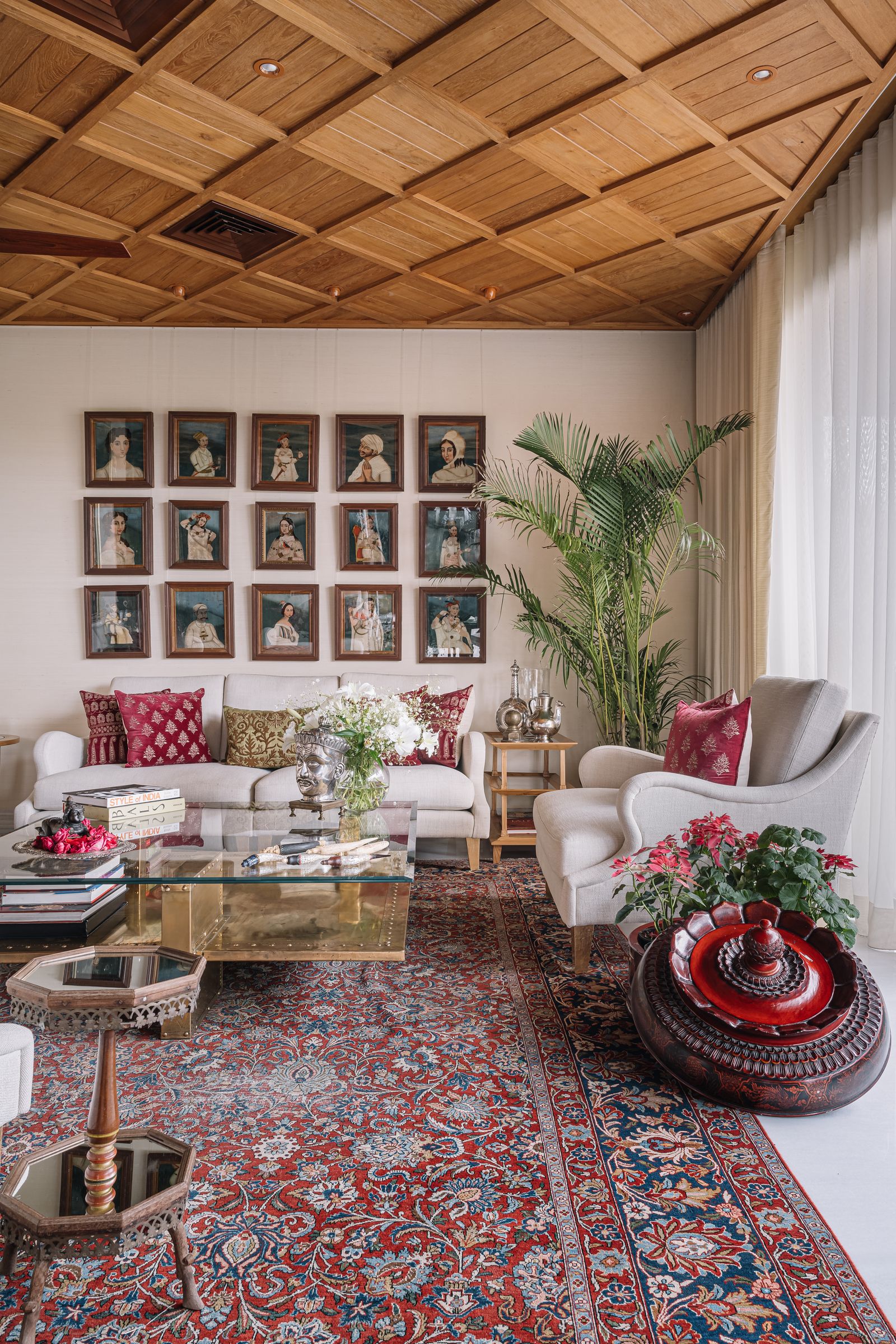 Image may contain Home Decor Indoors Interior Design Furniture Table Rug Couch Architecture and Building