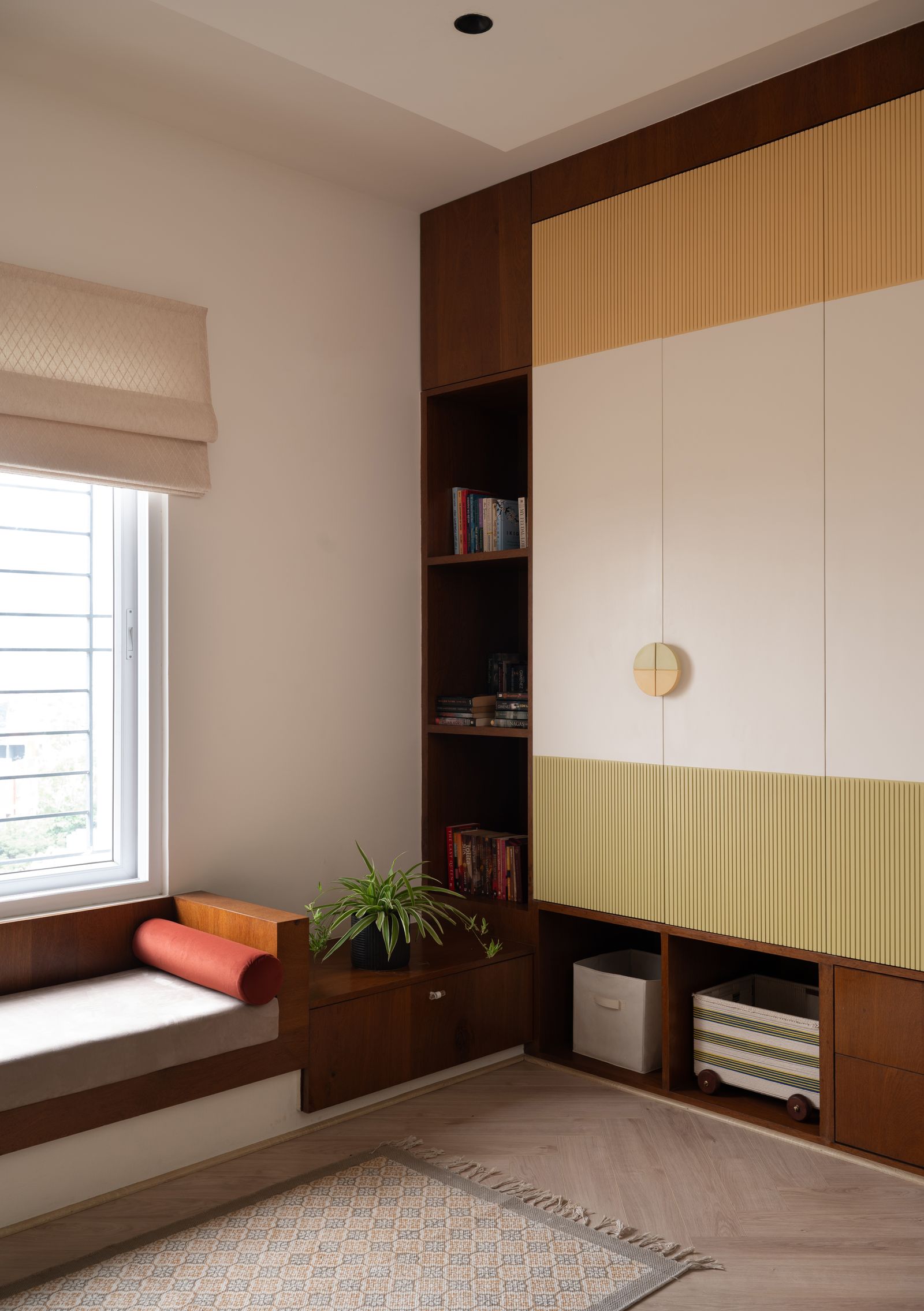 Image may contain Indoors Interior Design Plant Home Decor Furniture Rug Box and Corner