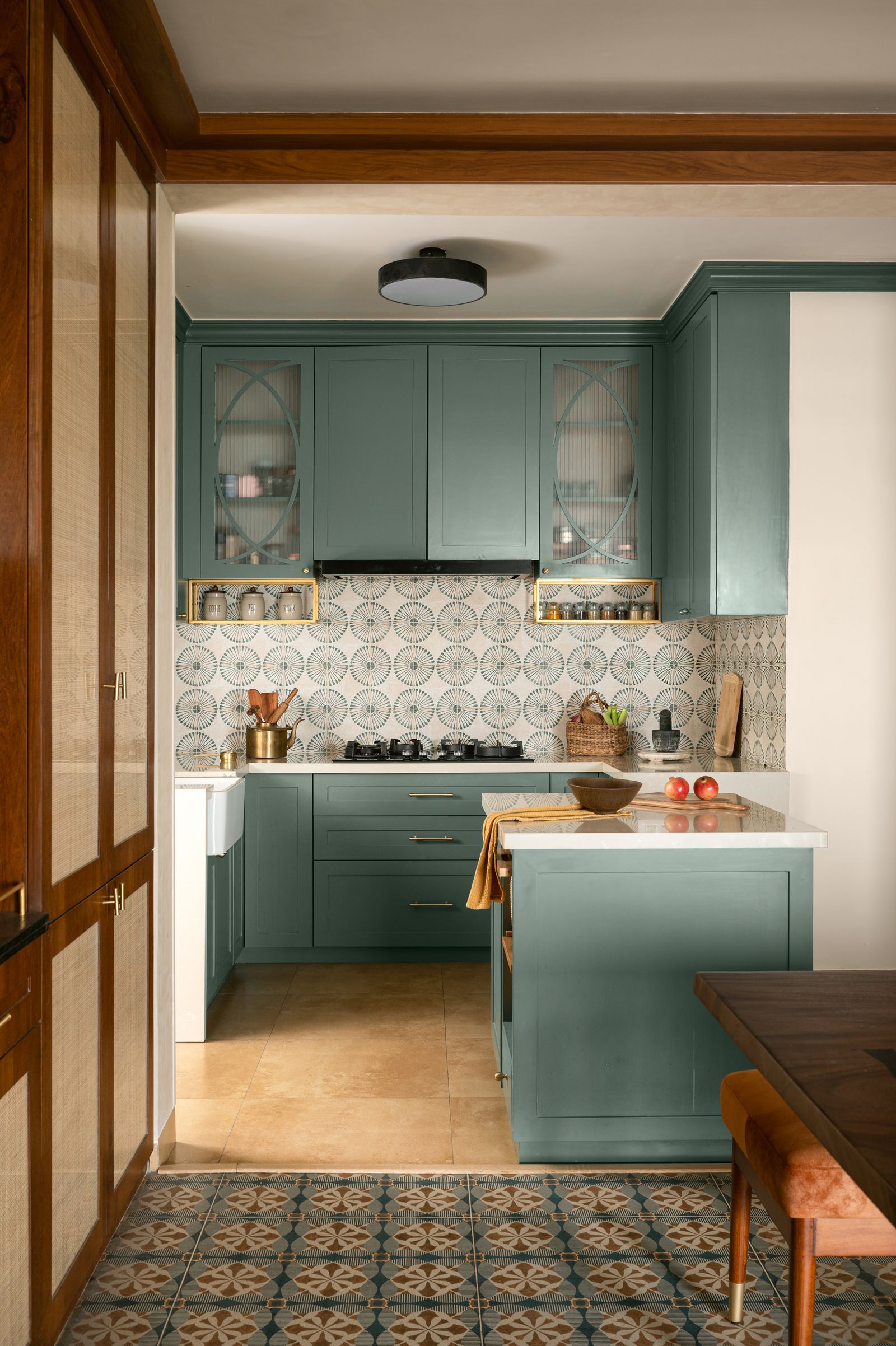 Image may contain Indoors Interior Design Kitchen Lamp Home Decor Desk Furniture Table Cooktop Floor and Chair