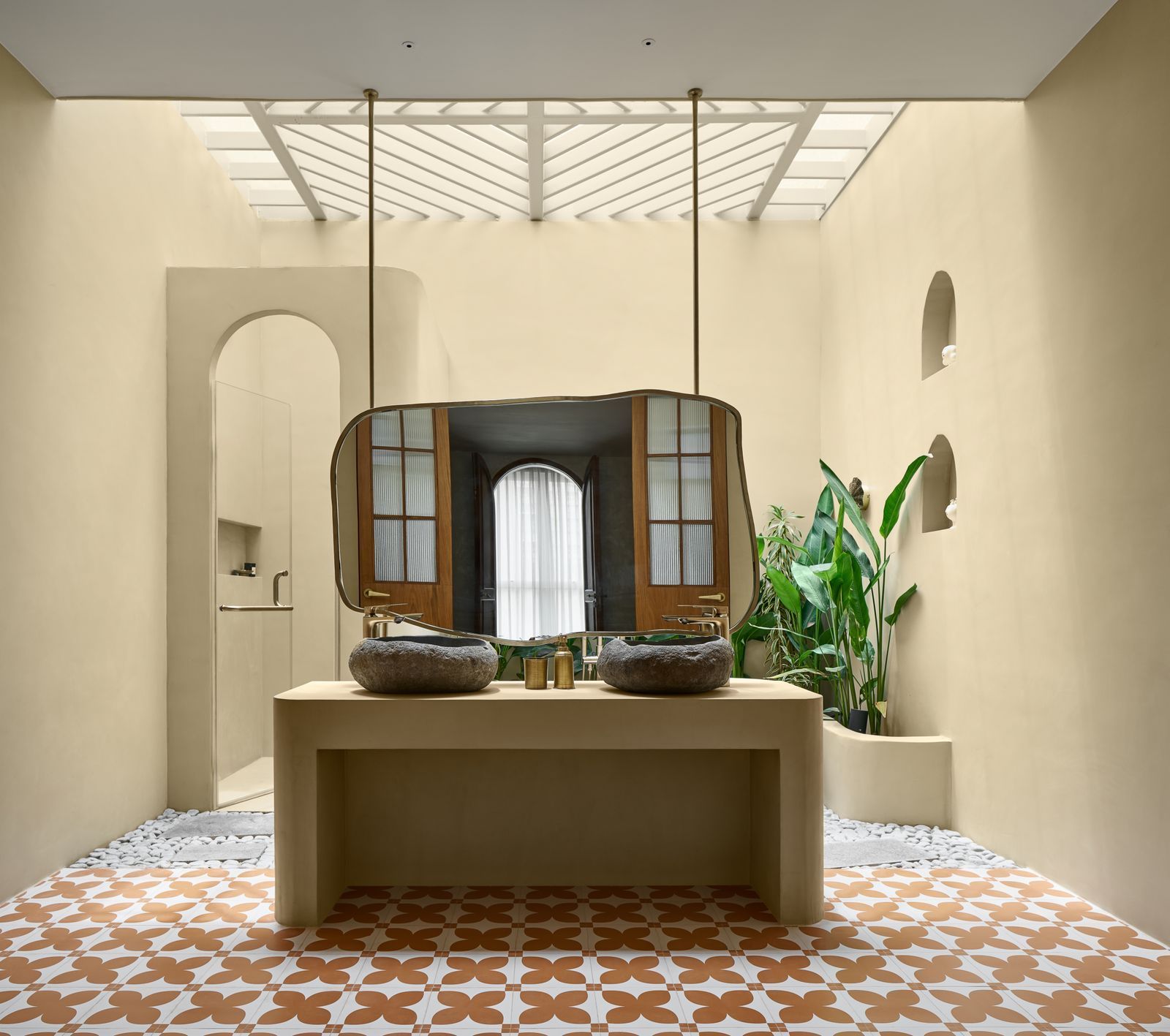 Image may contain Floor Indoors Interior Design Home Decor Furniture Plant Architecture Building Foyer and Bed