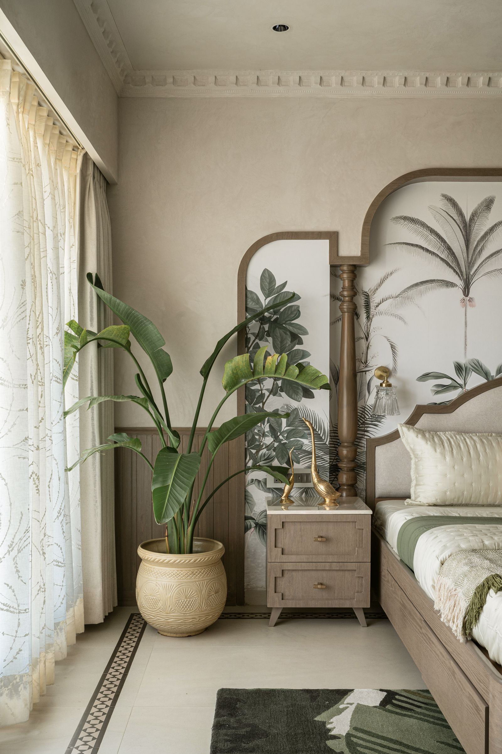 Image may contain Home Decor Plant Bed Furniture Indoors Interior Design and Rug