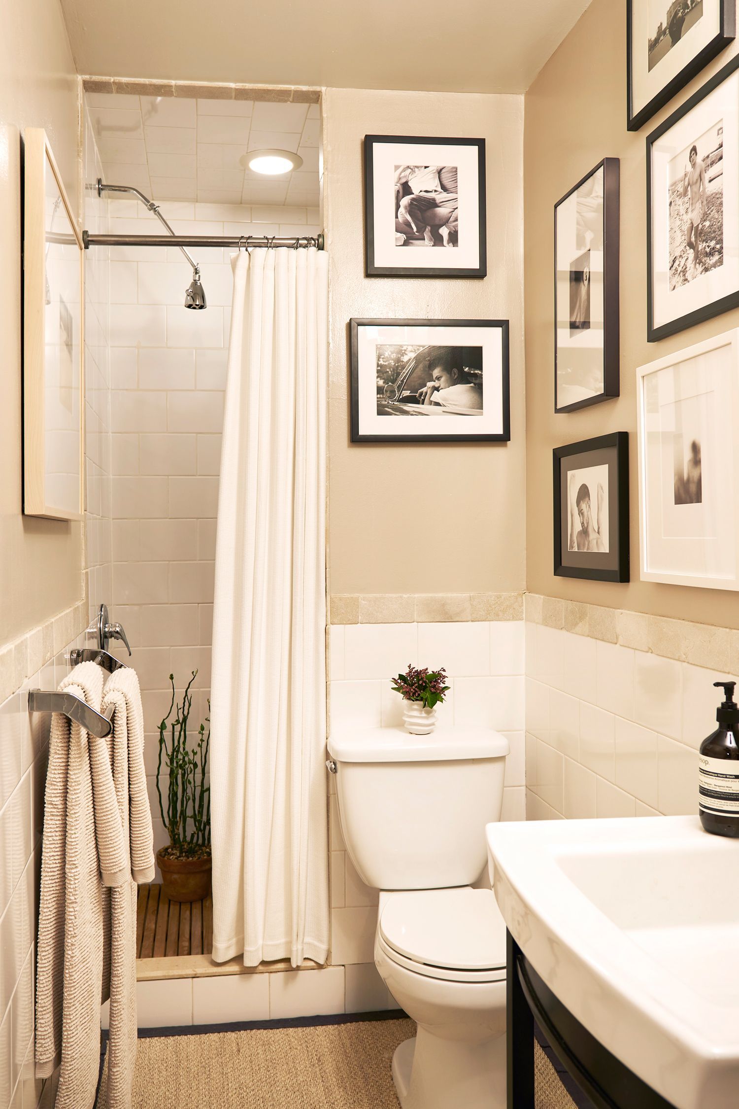 Image may contain Plant Art Painting Indoors Sink Person Bathroom Room Toilet and Sink Faucet