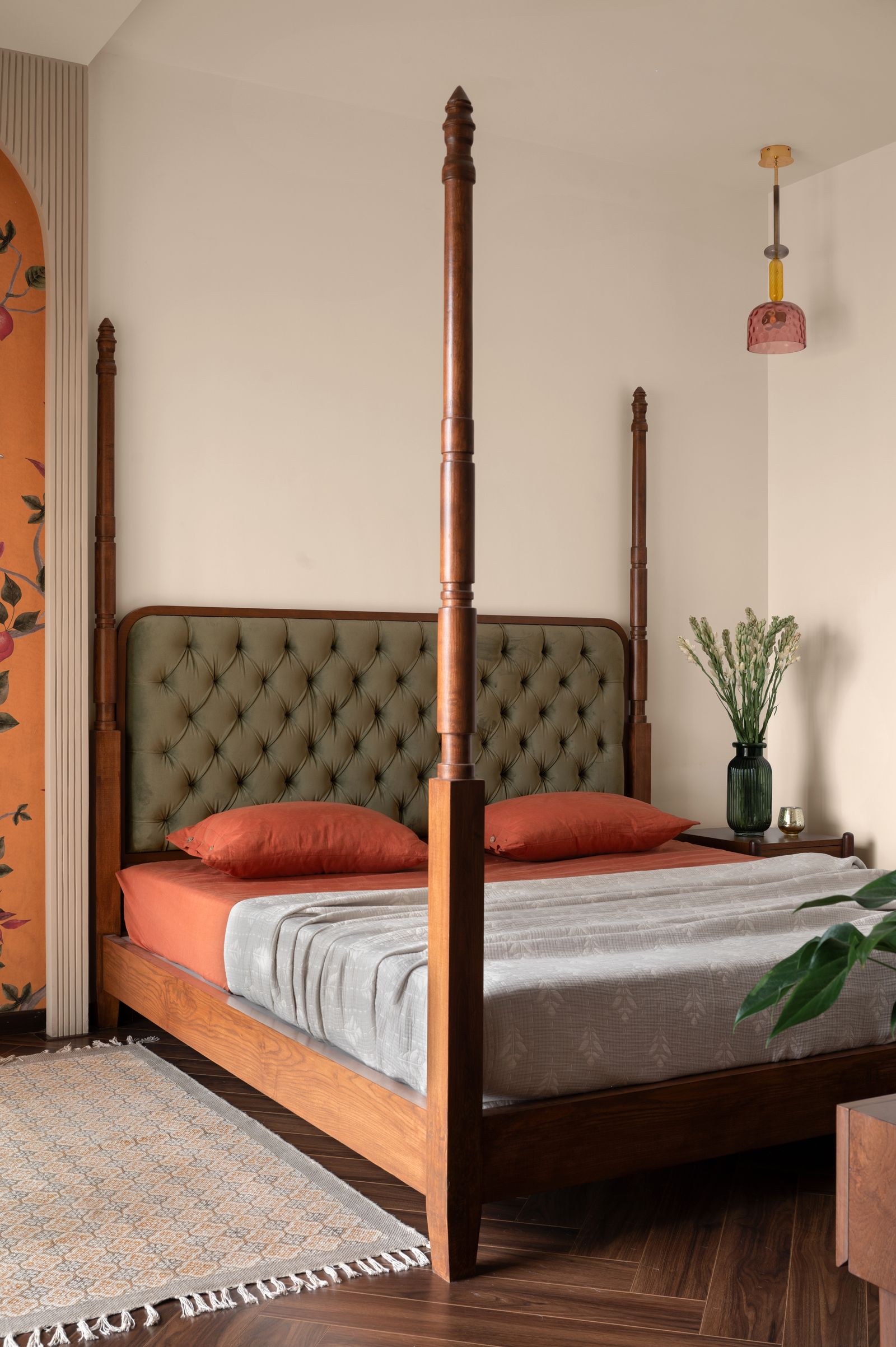Image may contain Furniture Bed Bedroom Indoors Room Lamp Home Decor Rug Canopy Bed and Plant