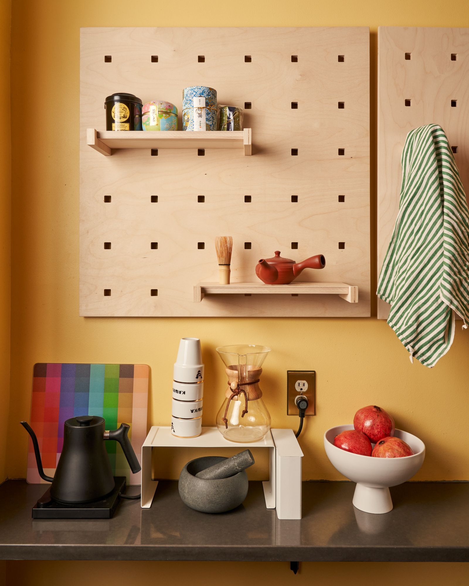 Image may contain Indoors Interior Design Shelf Sink Sink Faucet Chair and Furniture