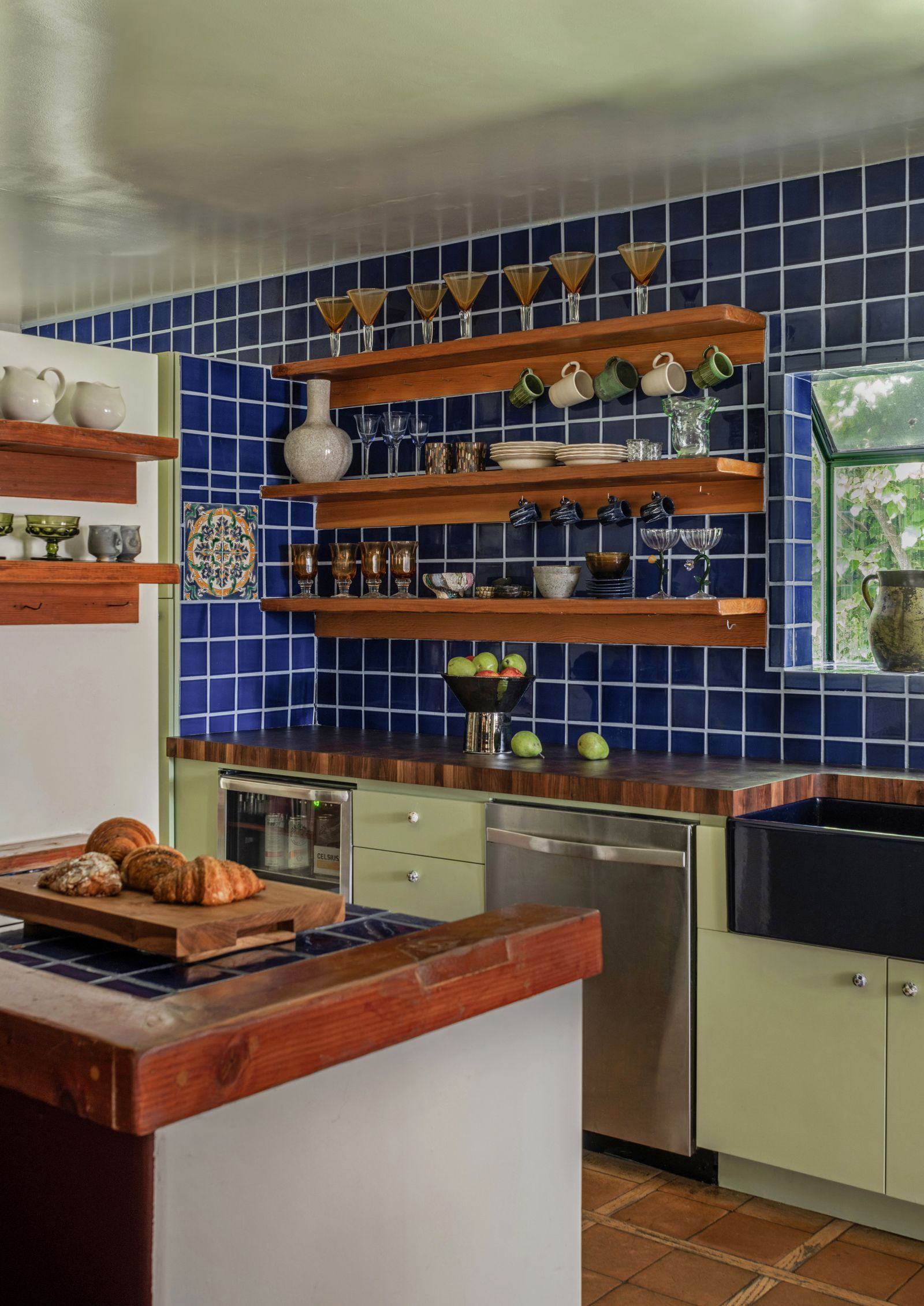 Image may contain Indoors Interior Design Kitchen Cup and Sink