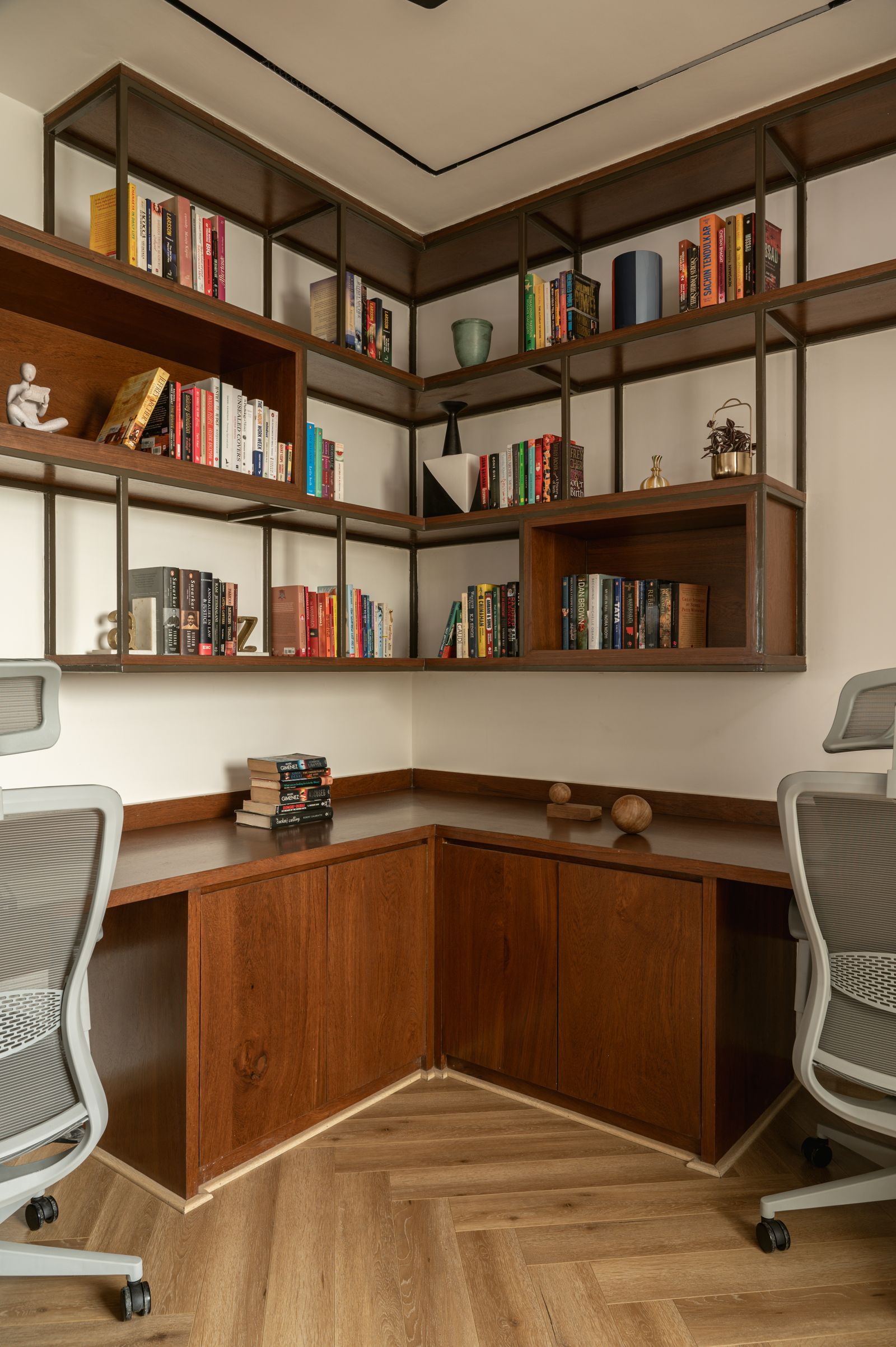 Image may contain Furniture Chair Bookcase Indoors Interior Design Wood Person Electronics Speaker and Hardwood