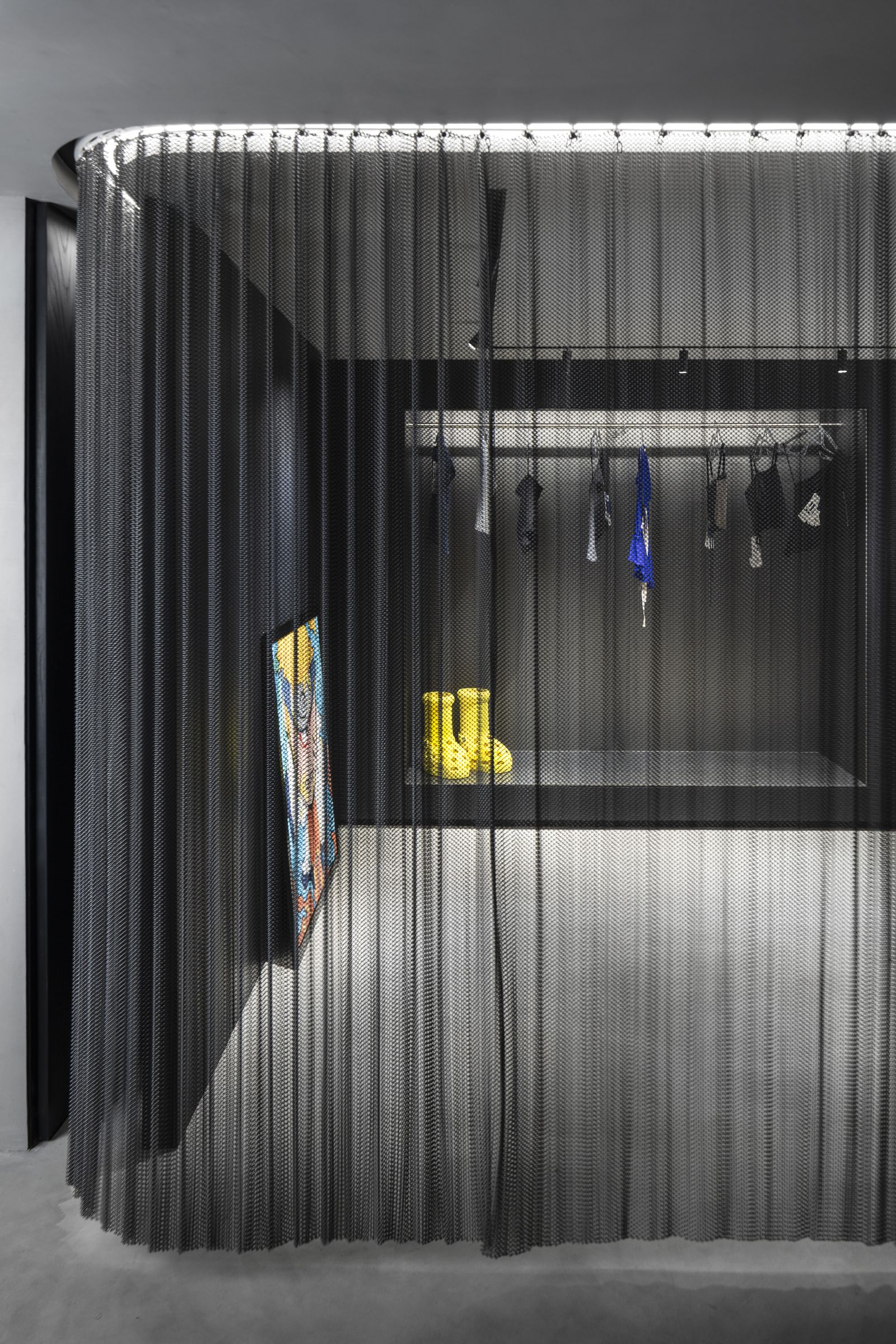Image may contain Indoors Interior Design Architecture Building Lighting and Curtain