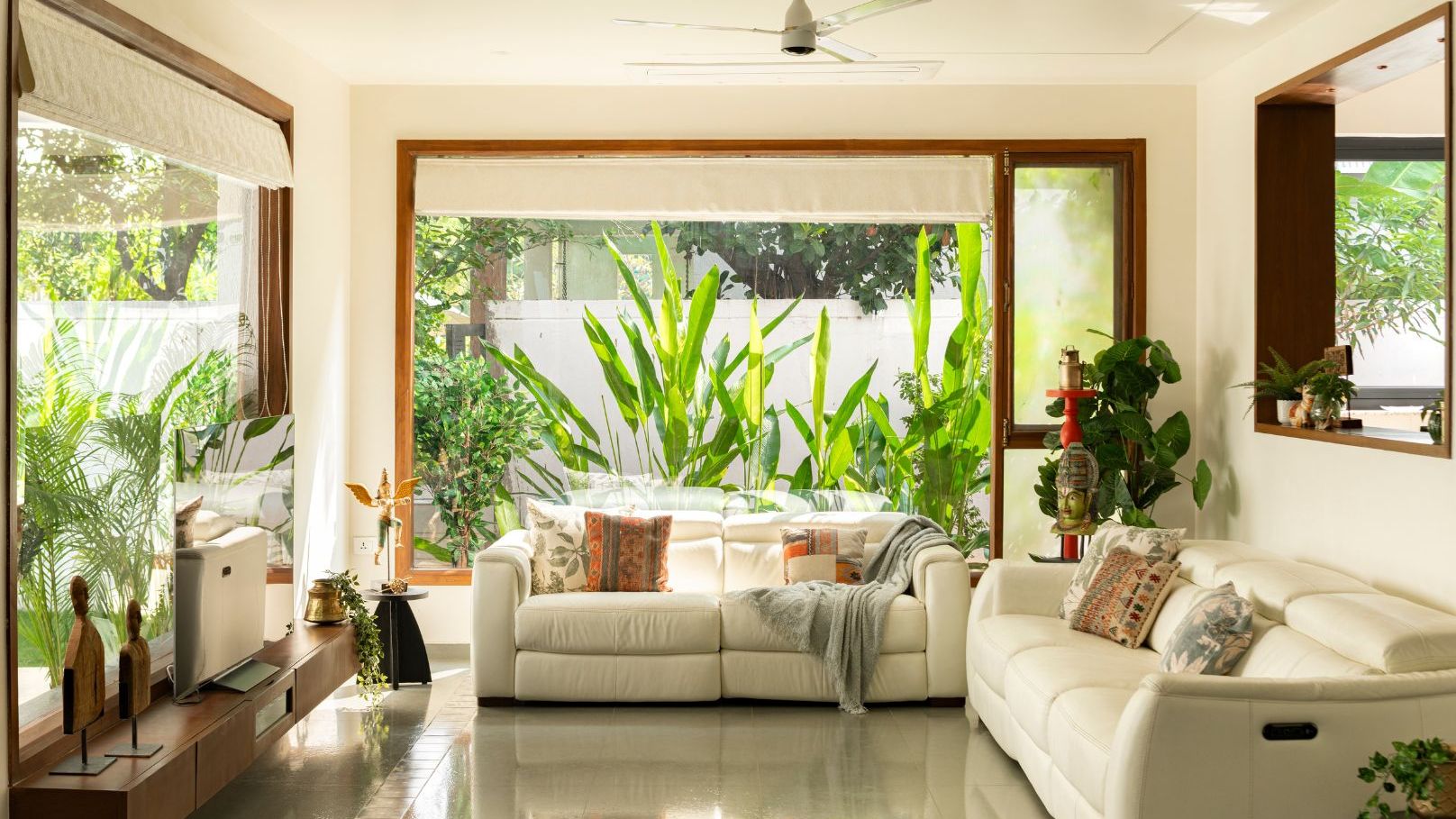Image may contain Couch Furniture Home Decor Architecture Building Indoors Living Room Room triplex villa and Table