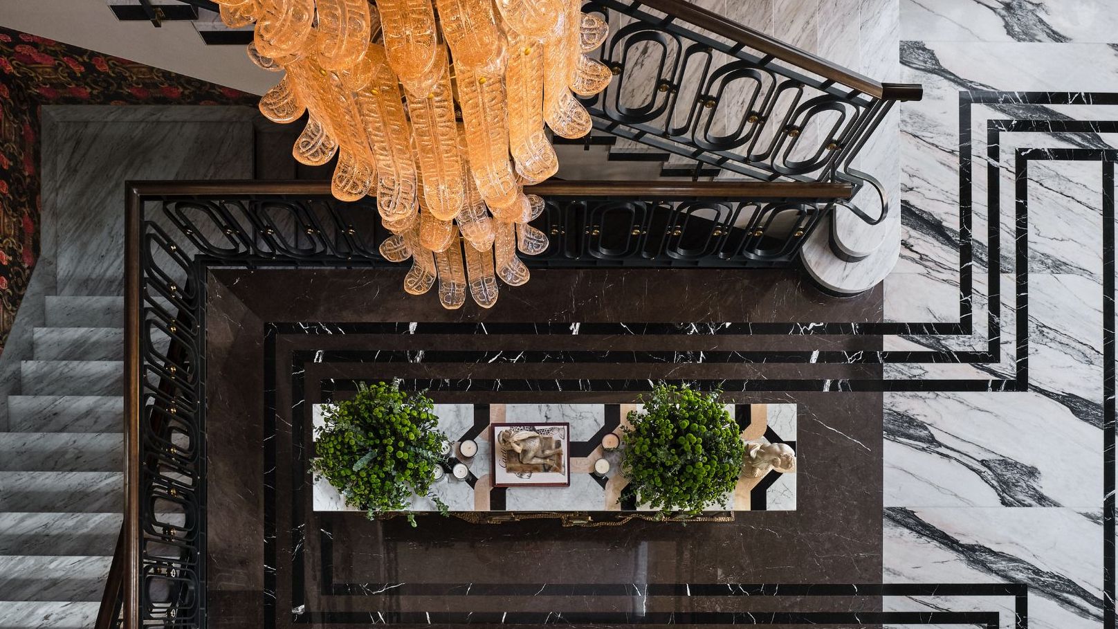 Image may contain Architecture Building Foyer Indoors Art Painting Floor mansion in Hyderabad and Interior Design
