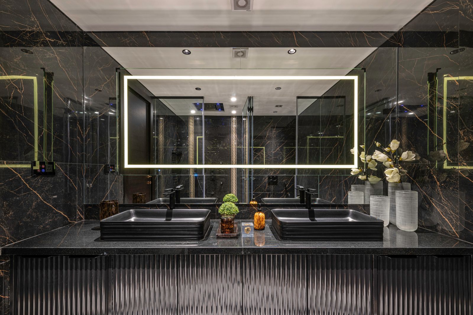 Image may contain Indoors Architecture Building Foyer Plant Sink Interior Design and Sink Faucet